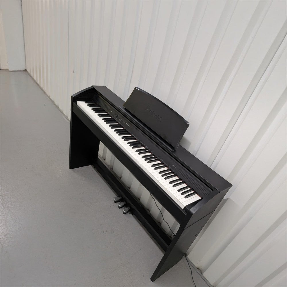 Đàn piano điện Casio PX750 màu đen dáng tủ tại Tân Nhạc Cụ với 88 phím búa đàn và ba pedal