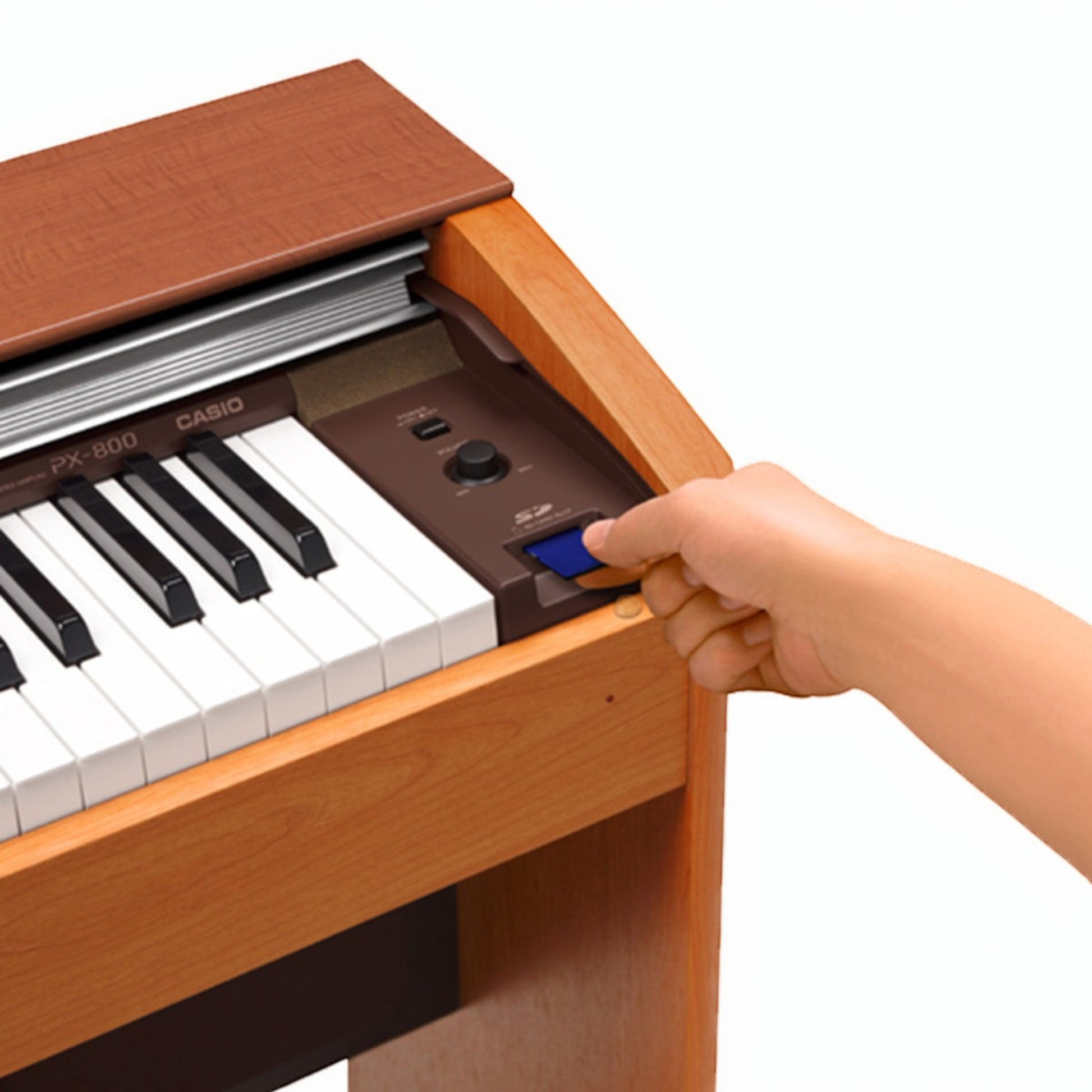 TÂN NHẠC CỤ Casio PX800, đàn piano điện màu gỗ với tay người đang cắm thẻ nhớ SD vào khe cắm bên cạnh bàn phím.