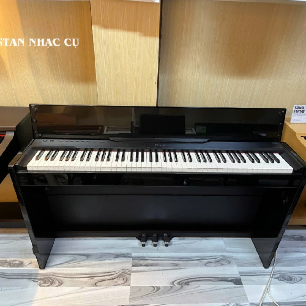 Đàn piano điện Casio PX830 màu đen bóng dáng tủ tại TÂN NHẠC CỤ với bàn phím búa 88 phím và thiết kế sang trọng