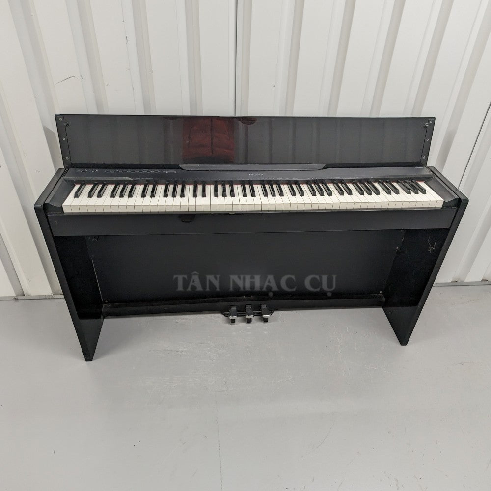 Đàn piano điện TÂN NHẠC CỤ Casio PX830 màu đen dáng tủ với bàn phím 88 phím búa và ba pedal chân đế