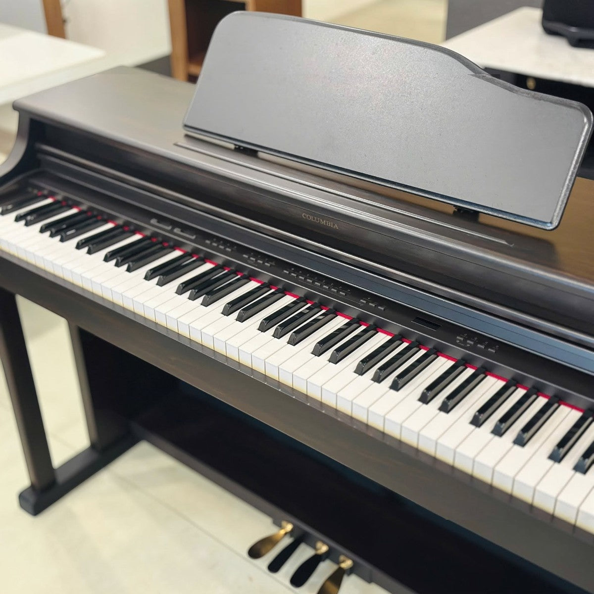 Đàn piano điện Columbia EP1500 màu nâu gỗ nhỏ gọn tại Tân Nhạc Cụ, lý tưởng cho người mới bắt đầu.