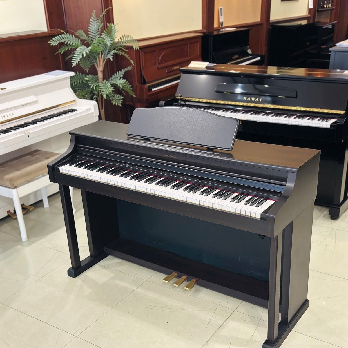 Đàn piano điện TÂN NHẠC CỤ Columbia EP1500 màu nâu gỗ kiểu dáng nhỏ gọn đặt tại showroom