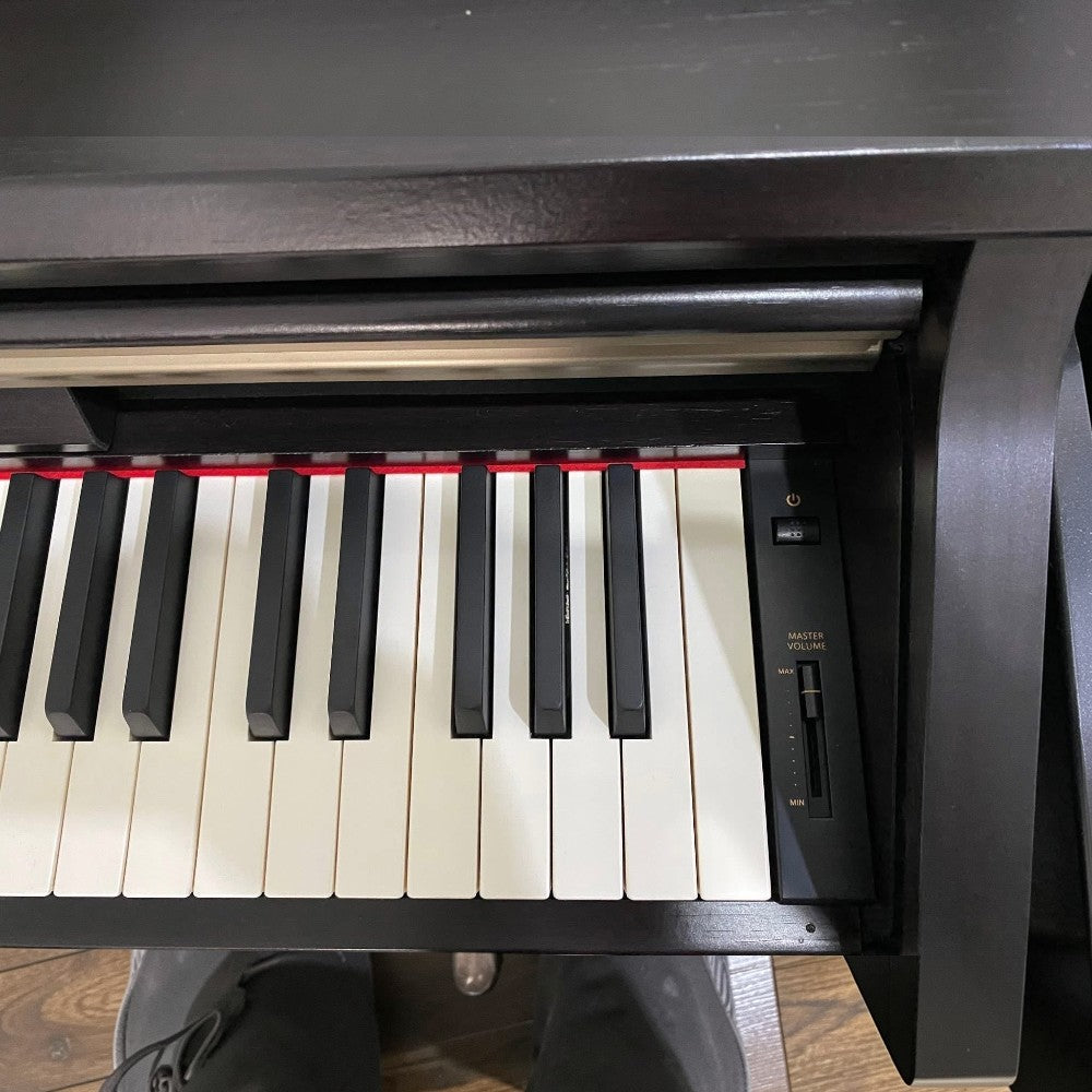 Đàn piano điện Kawai CA13 phím gỗ màu đen tại Tân Nhạc Cụ với bảng điều khiển âm lượng tối giản