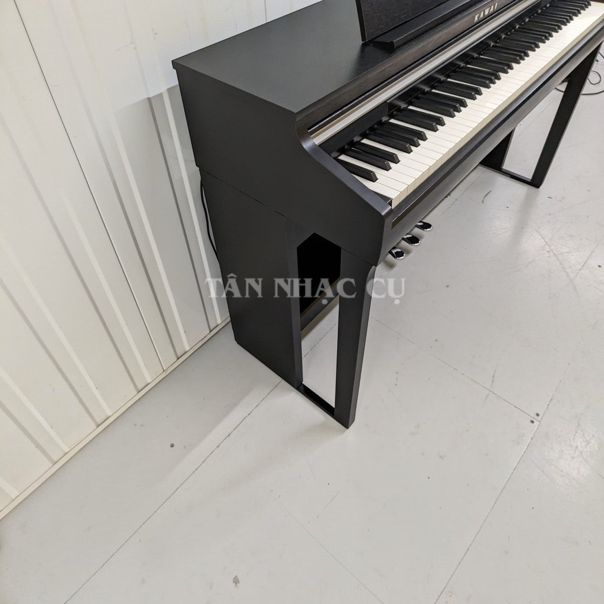 Đàn piano điện Kawai CA48 màu đen tại Tân Nhạc Cụ với bàn phím gỗ Grand Feel Compact và thiết kế hiện đại