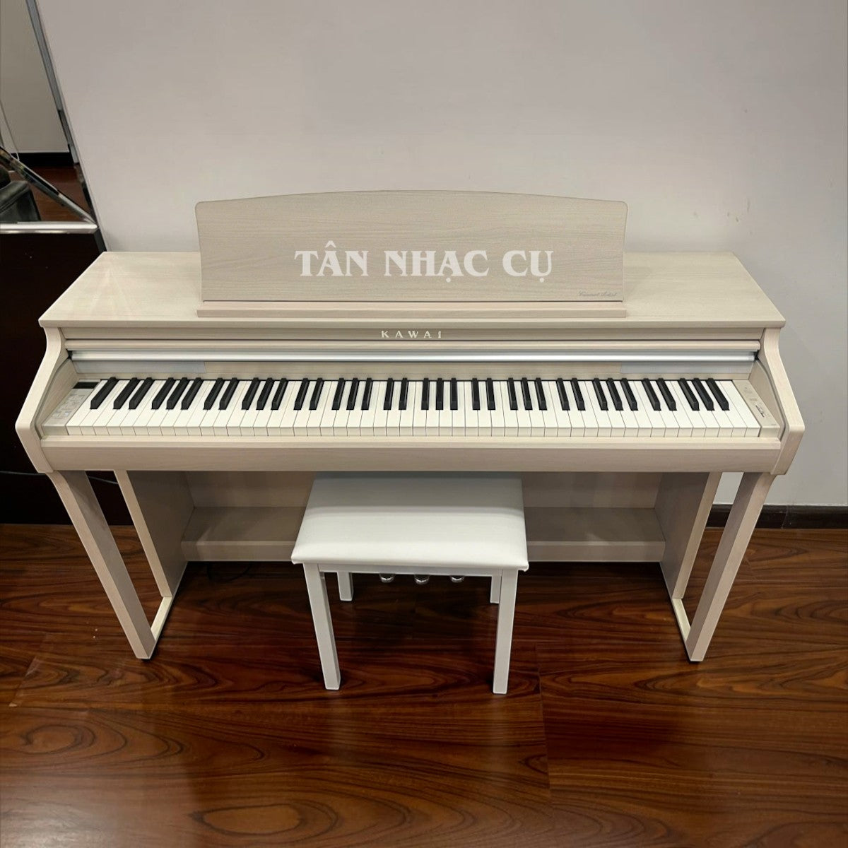 Đàn piano điện Kawai CA48 màu trắng tại Tân Nhạc Cụ với bàn phím gỗ Grand Feel Compact và thiết kế sang trọng