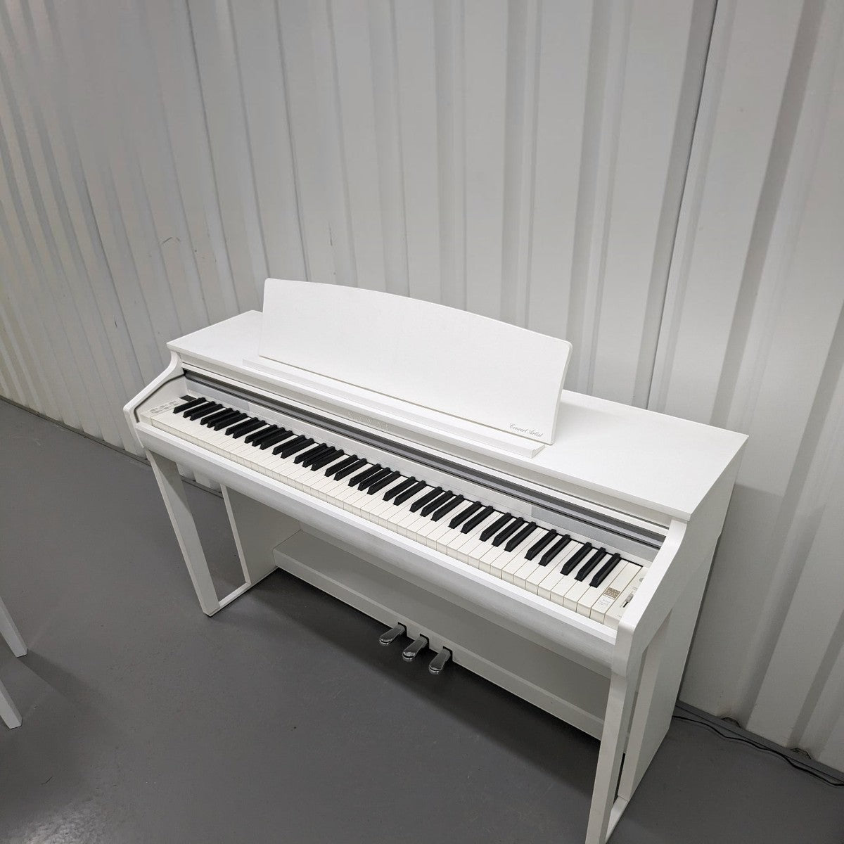 Đàn piano điện Kawai CA48 màu trắng tại Tân Nhạc Cụ với bàn phím gỗ Grand Feel Compact cao cấp
