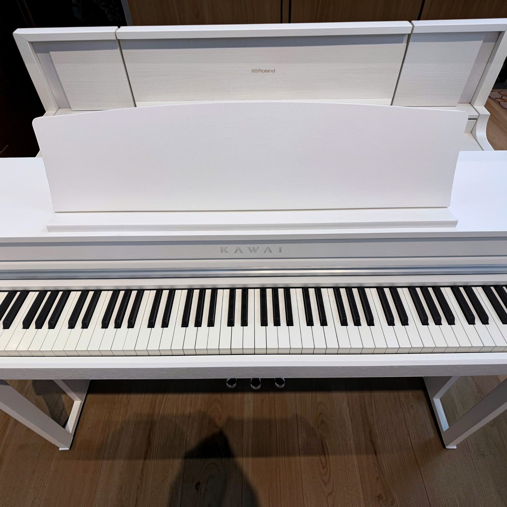 Đàn piano điện Kawai CA49 màu trắng dáng tủ với bàn phím gỗ Grand Feel Compact tại Tân Nhạc Cụ