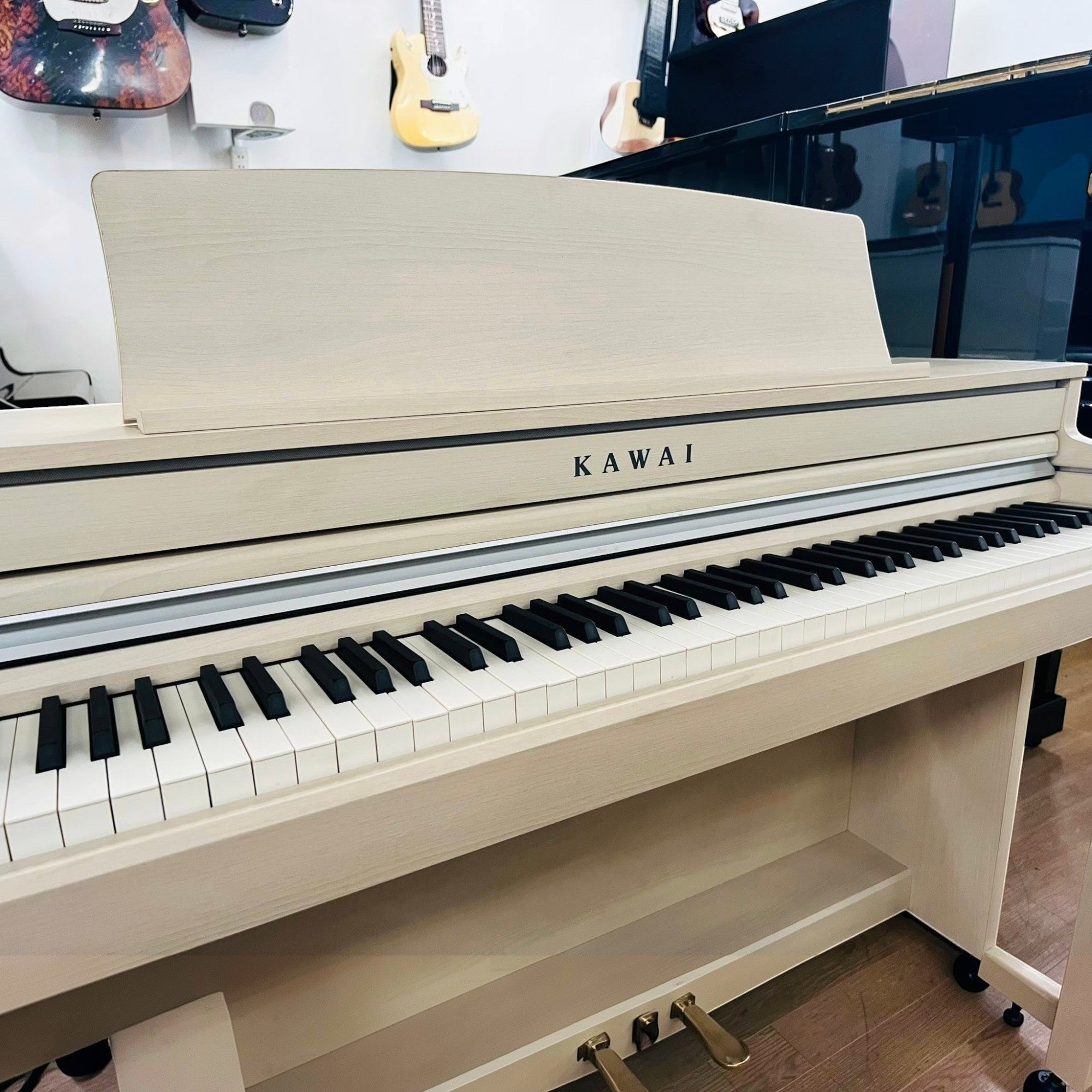 Đàn piano điện Kawai CA49 màu trắng tại TÂN NHẠC CỤ với bàn phím gỗ Grand Feel Compact cao cấp