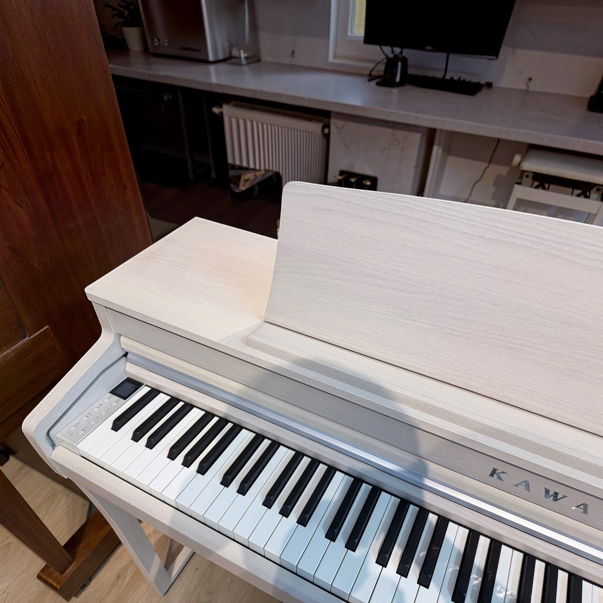 Đàn piano điện Kawai CA49 màu trắng Satin White với bàn phím gỗ Grand Feel Compact tại TÂN NHẠC CỤ