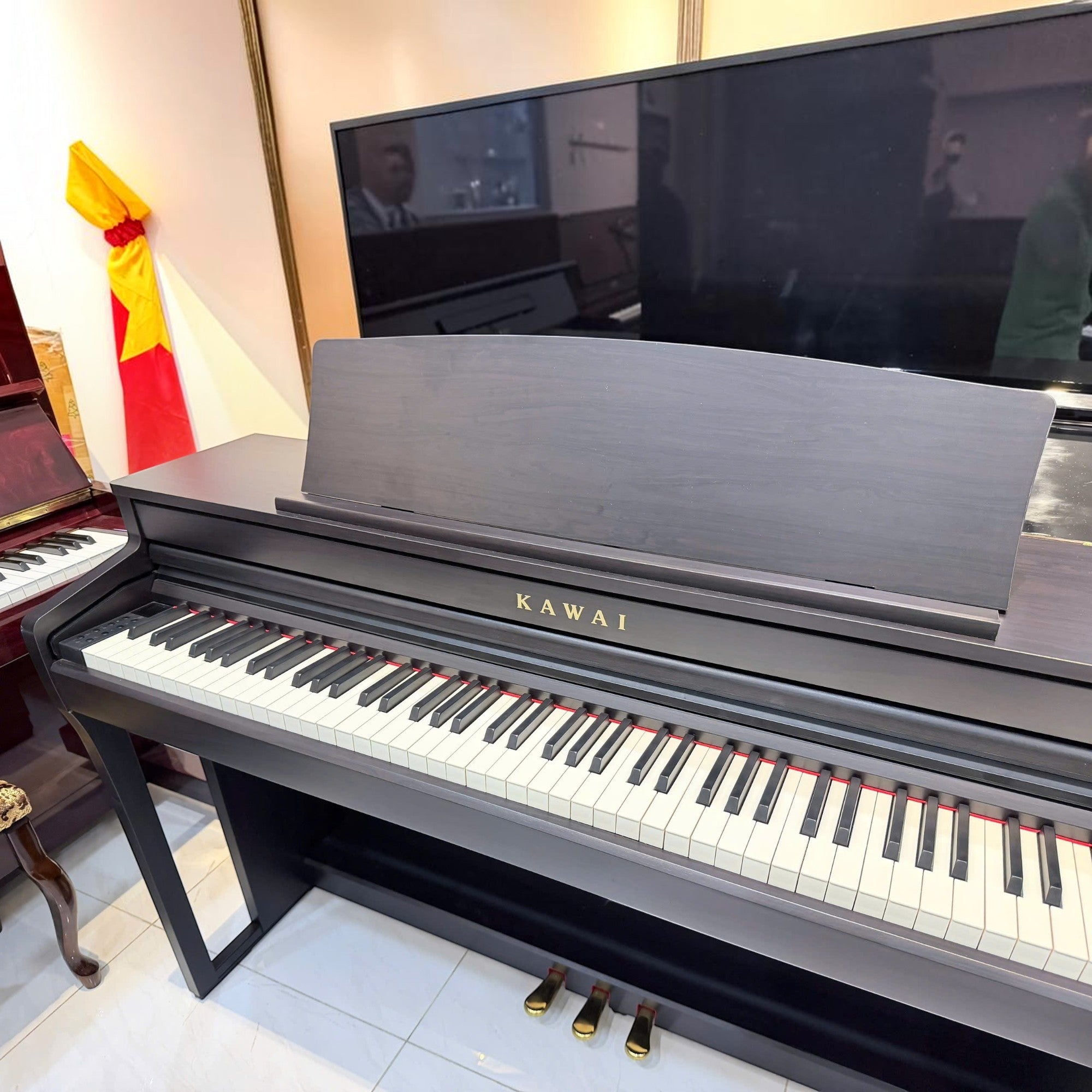 Đàn piano điện Kawai CA49 dáng tủ phím gỗ màu đen sang trọng tại Tân Nhạc Cụ