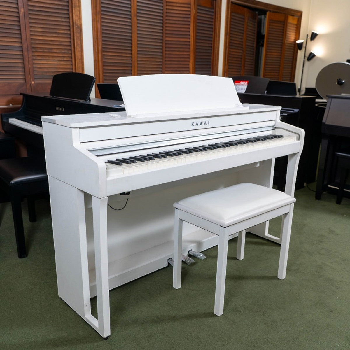 Đàn piano điện Kawai CA59 màu trắng tại TÂN NHẠC CỤ với bàn phím gỗ Grand Feel Compact cao cấp