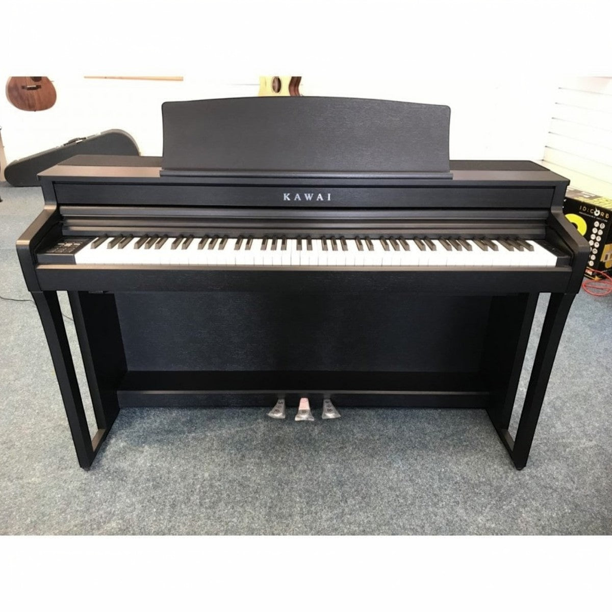 Đàn piano điện TÂN NHẠC CỤ Kawai CA59 màu đen với bàn phím gỗ Grand Feel Compact cao cấp