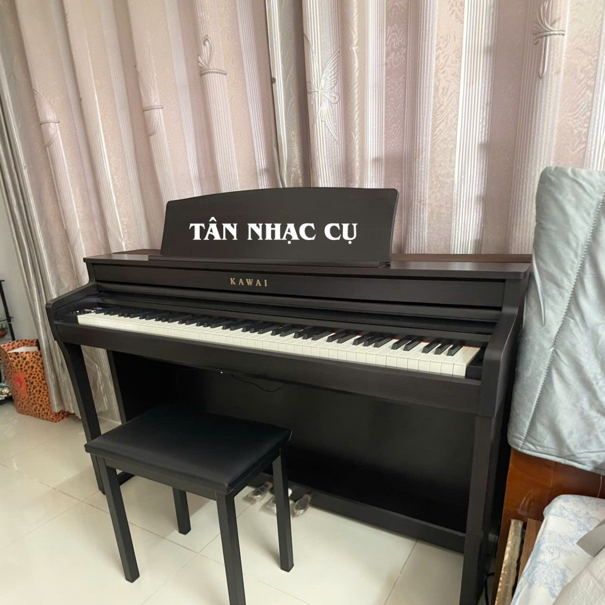 Đàn piano điện Kawai CA59 màu đen sang trọng với bàn phím gỗ Grand Feel Compact tại cửa hàng TÂN NHẠC CỤ
