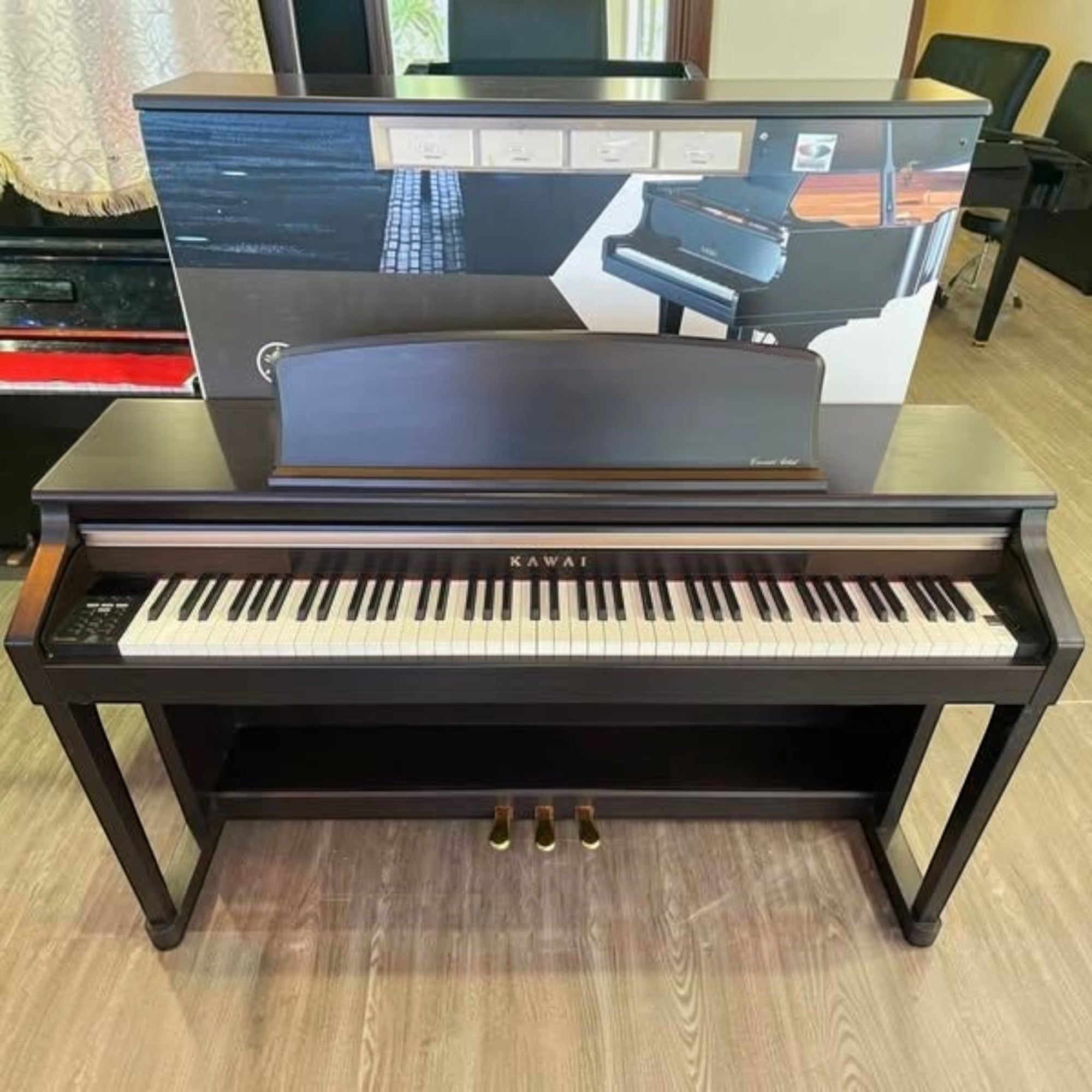 Đàn piano điện Kawai CA65 màu nâu đậm với bàn phím gỗ Grand Feel tại cửa hàng TÂN NHẠC CỤ