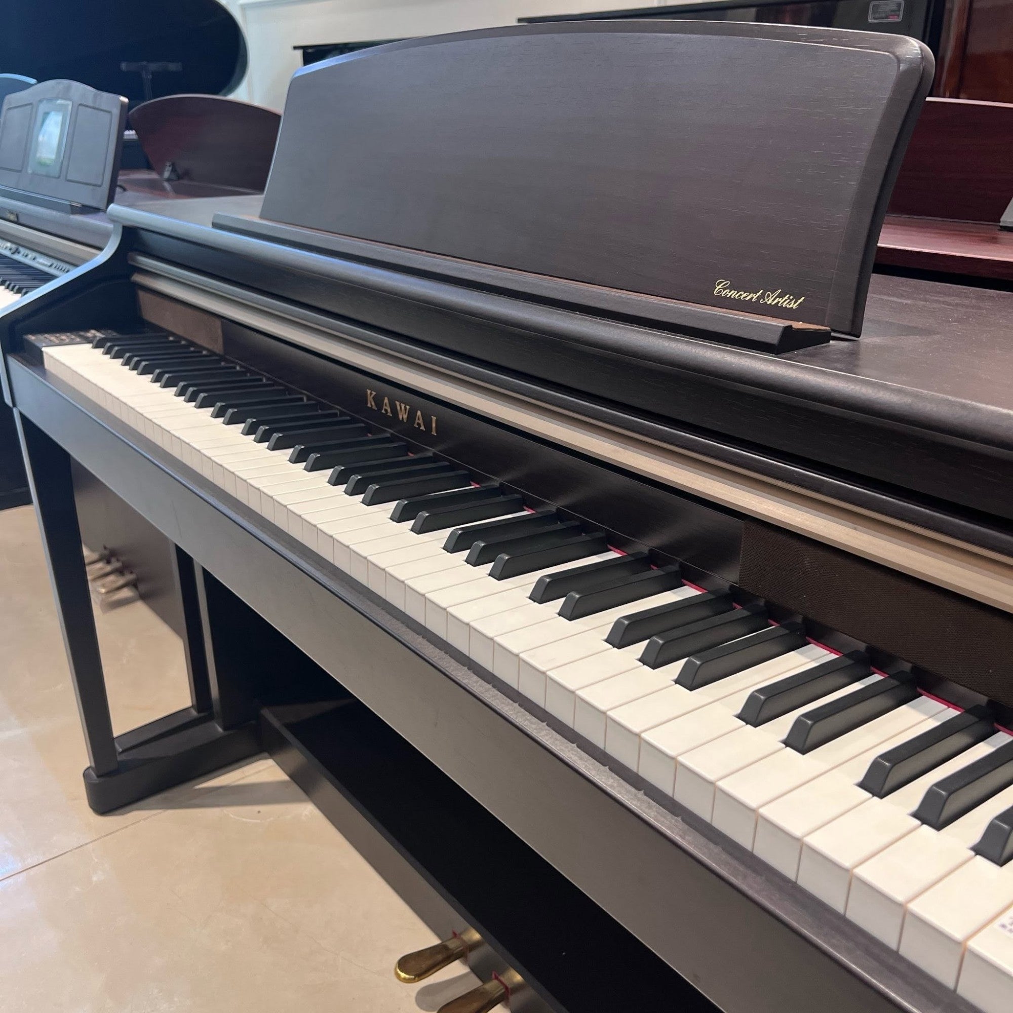 Đàn piano điện Kawai CA65 màu nâu đậm với bàn phím gỗ Grand Feel tại cửa hàng TÂN NHẠC CỤ
