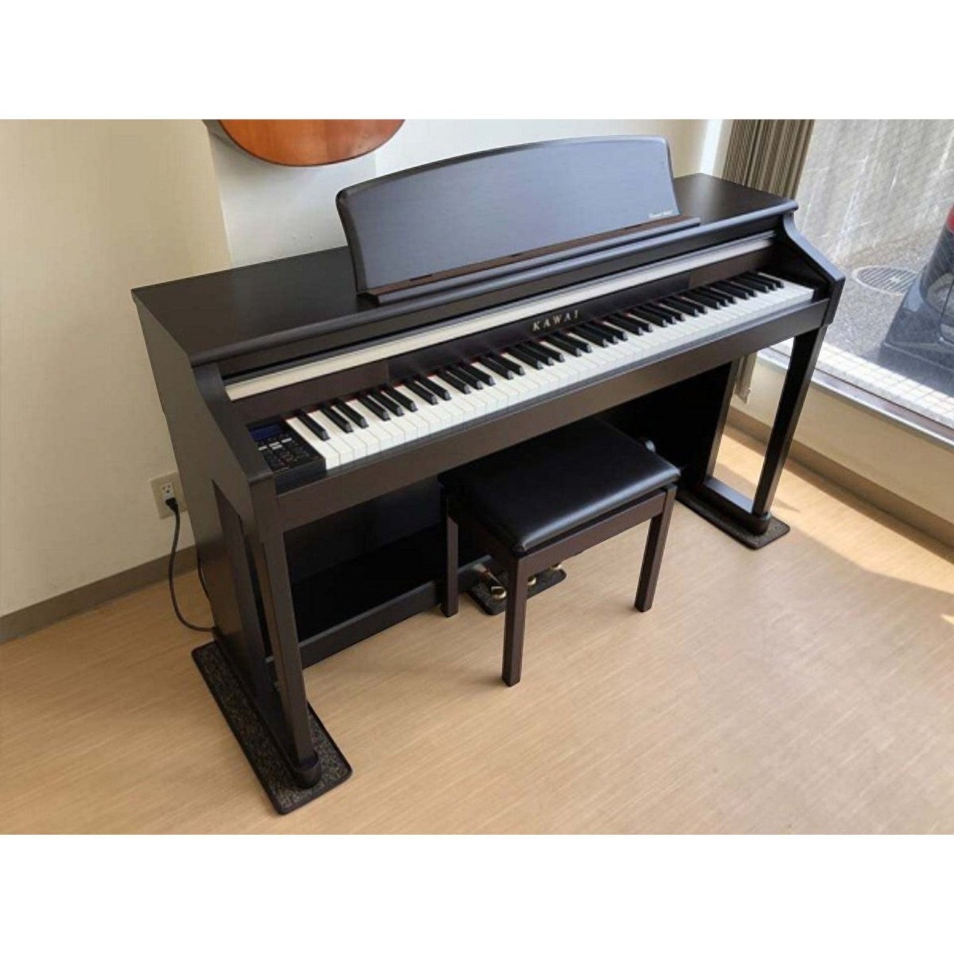 Đàn piano điện Kawai CA65 màu nâu đậm dáng tủ sang trọng, phím gỗ Grand Feel tại TÂN NHẠC CỤ
