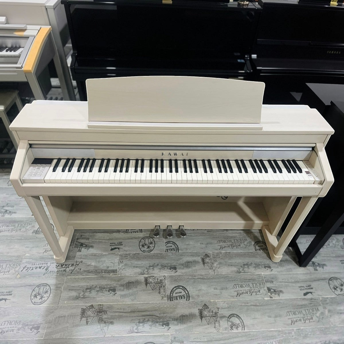 Đàn piano điện TÂN NHẠC CỤ Kawai CA67 màu trắng kem với bàn phím gỗ Grand Feel II cao cấp