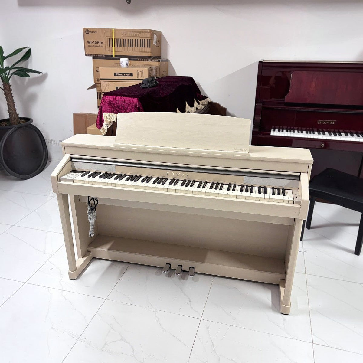 Đàn piano điện TÂN NHẠC CỤ Kawai CA67 màu trắng kem với bàn phím gỗ Grand Feel II cao cấp tại showroom