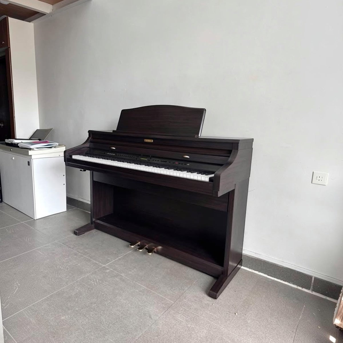 Đàn piano điện Kawai CA71 màu gỗ tối tại Tân Nhạc Cụ với bàn phím gỗ AWA Grand PRO II chân thực