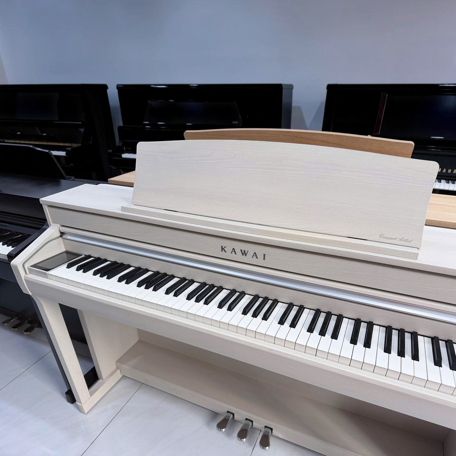 Đàn piano điện Kawai CA78 màu trắng dáng tủ sang trọng tại TÂN NHẠC CỤ với bàn phím gỗ Grand Feel II cao cấp