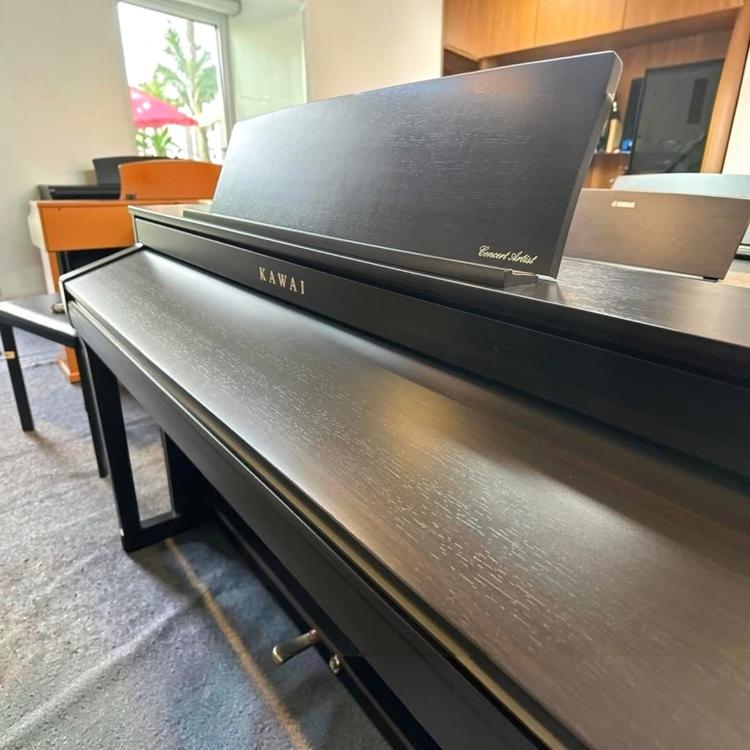 Đàn piano điện Kawai CA78 dáng tủ màu đen sang trọng tại TÂN NHẠC CỤ với thiết kế phím gỗ cao cấp