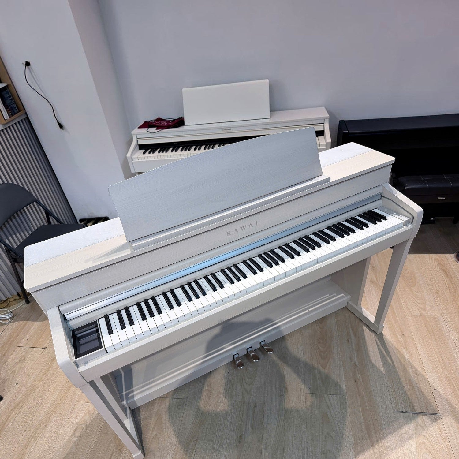 Đàn piano điện Kawai CA79 màu trắng tại TÂN NHẠC CỤ với bàn phím gỗ Grand Feel III cao cấp