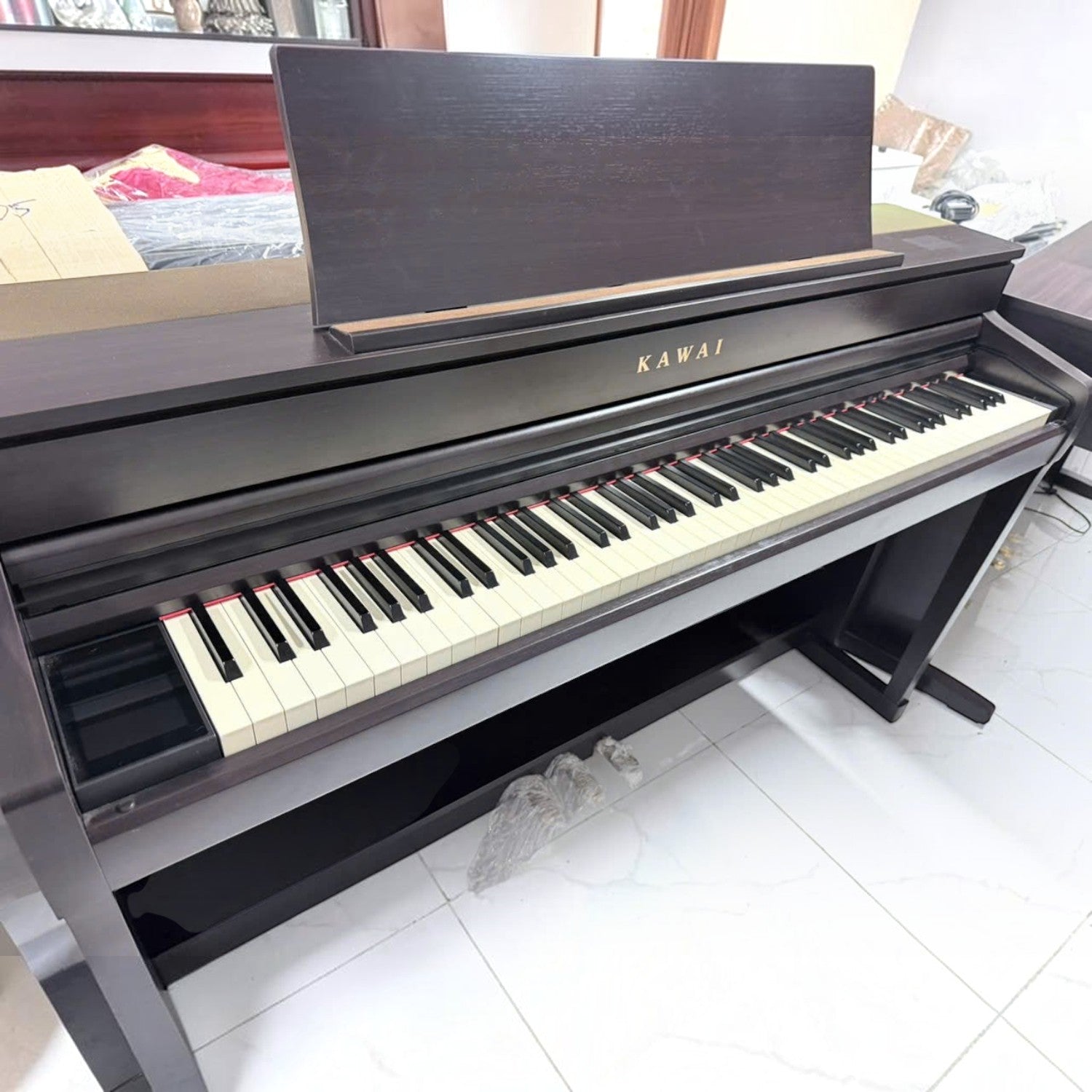 Đàn piano điện Kawai CA79 màu nâu gỗ tại TÂN NHẠC CỤ với bàn phím gỗ Grand Feel III cao cấp