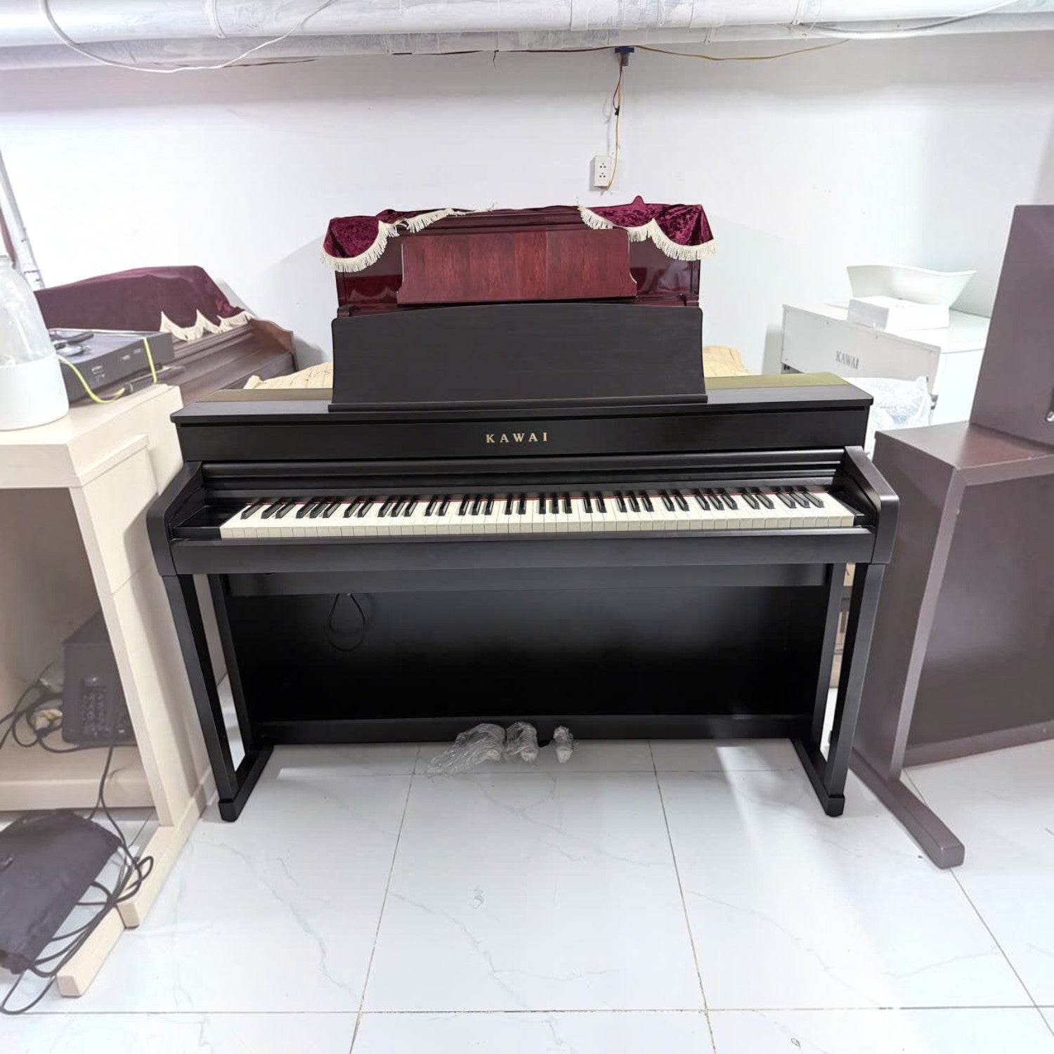Đàn piano điện Kawai CA79 màu đen sang trọng với bàn phím gỗ Grand Feel III tại cửa hàng TÂN NHẠC CỤ