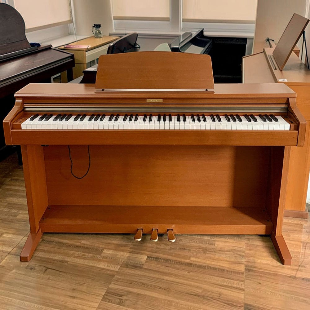 Đàn piano điện Kawai CN21 dáng tủ màu gỗ tự nhiên với 88 phím búa AHA IV tại showroom TÂN NHẠC CỤ