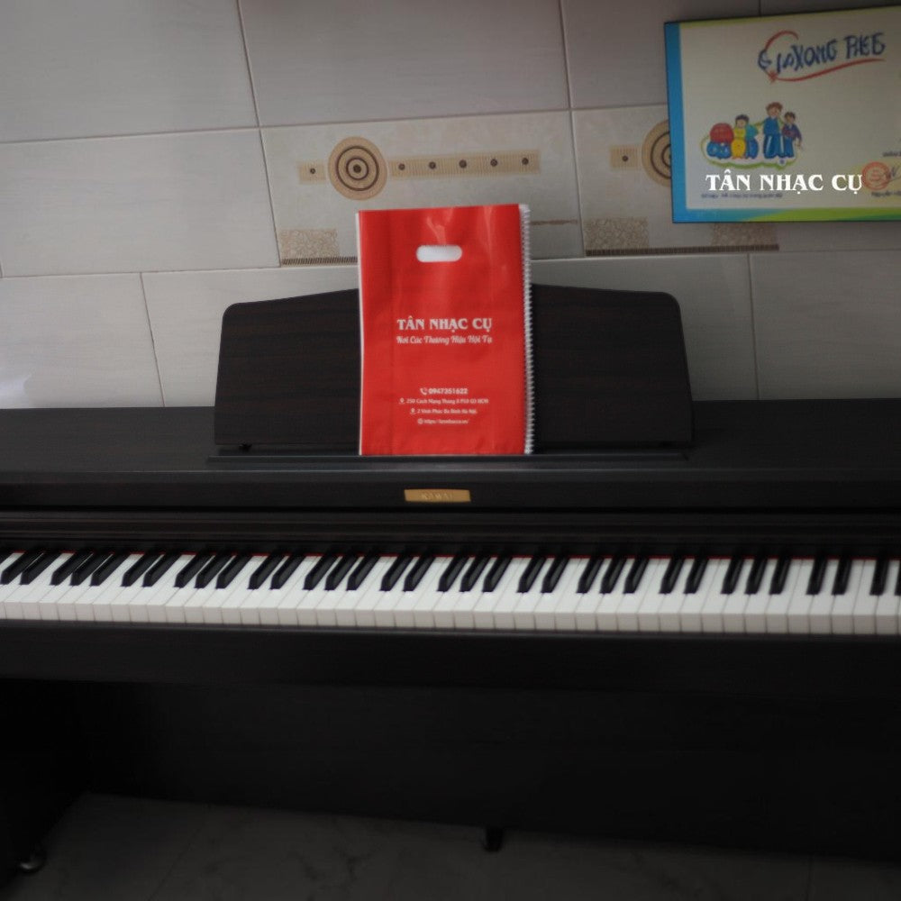 Đàn piano điện Kawai CN21 màu nâu gỗ sang trọng, dáng tủ chắc chắn tại TÂN NHẠC CỤ