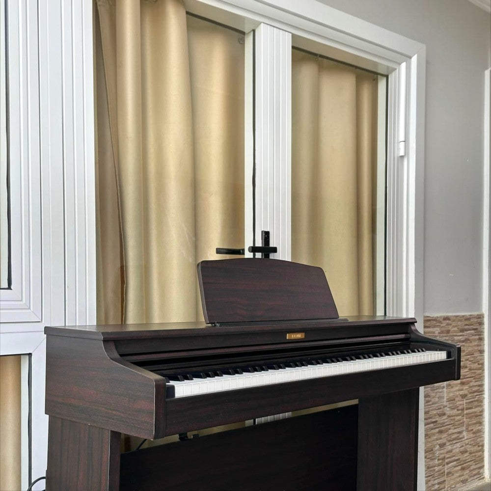 Đàn piano điện Kawai CN21 màu gỗ tối sang trọng với thiết kế dáng tủ tại TÂN NHẠC CỤ
