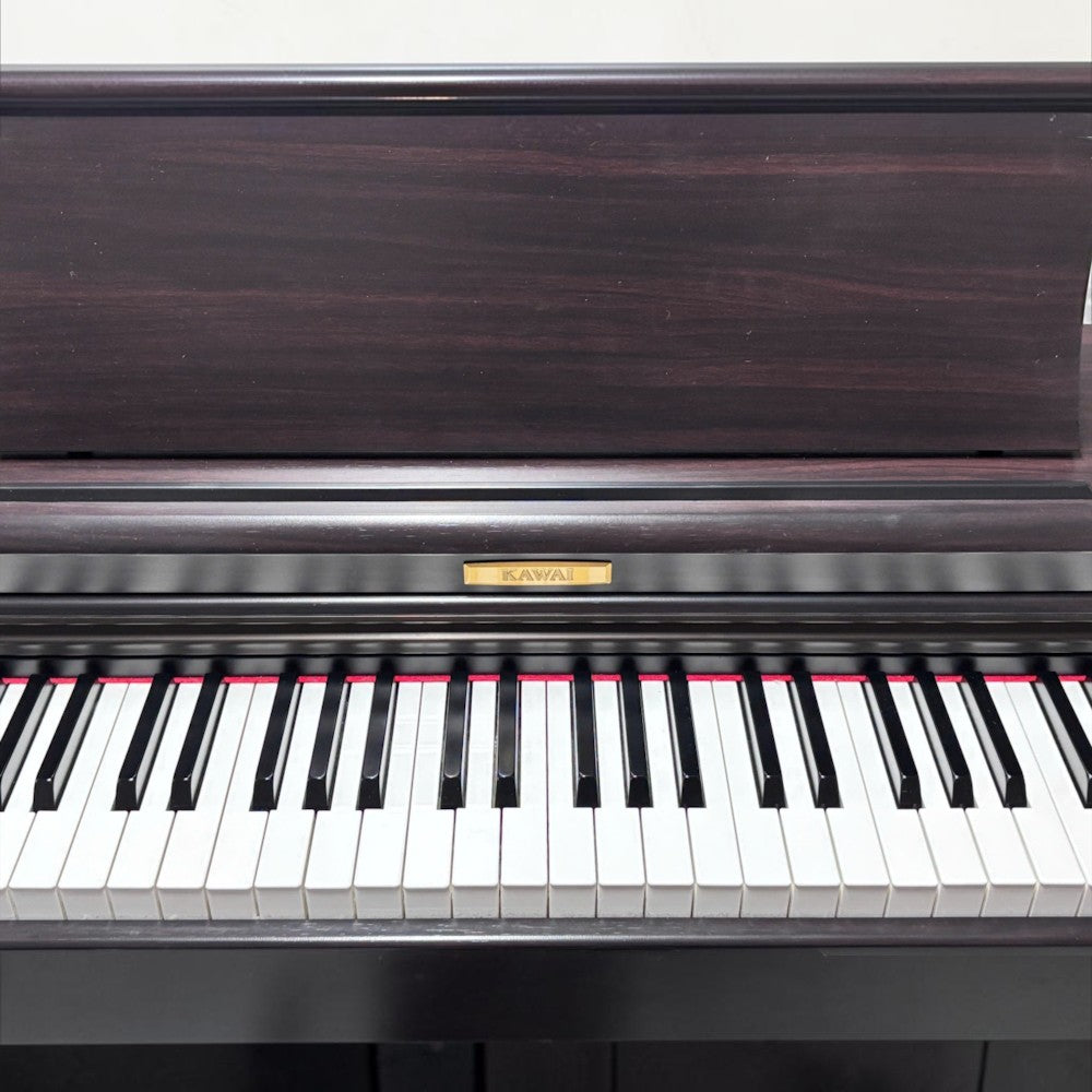 Đàn piano điện Kawai CN22 dáng tủ màu gỗ tối tại TÂN NHẠC CỤ với bàn phím búa 88 phím Ivory Touch