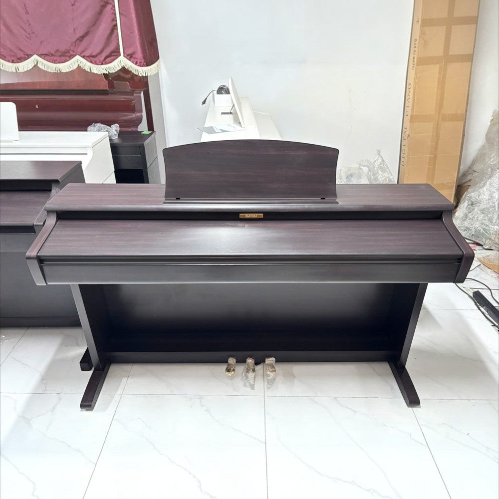 Đàn piano điện Kawai CN22 dáng tủ màu gỗ tối tại cửa hàng TÂN NHẠC CỤ
