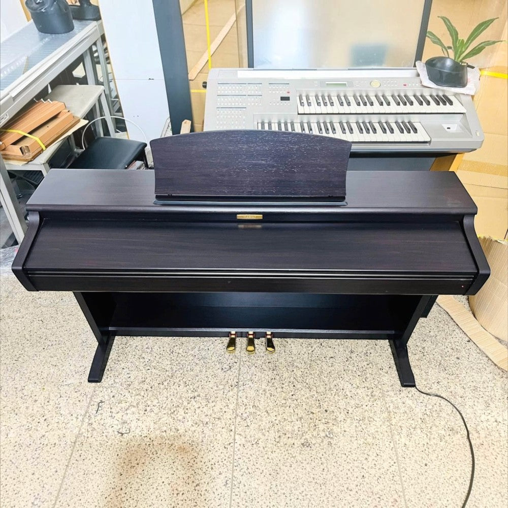 Đàn piano điện Kawai CN22 dáng tủ màu đen sang trọng tại TÂN NHẠC CỤ với 3 pedal vàng nổi bật