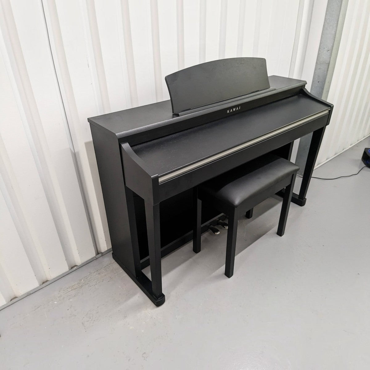 Đàn piano điện Kawai CN33 màu đen dáng tủ sang trọng, thiết kế hiện đại tại cửa hàng TÂN NHẠC CỤ