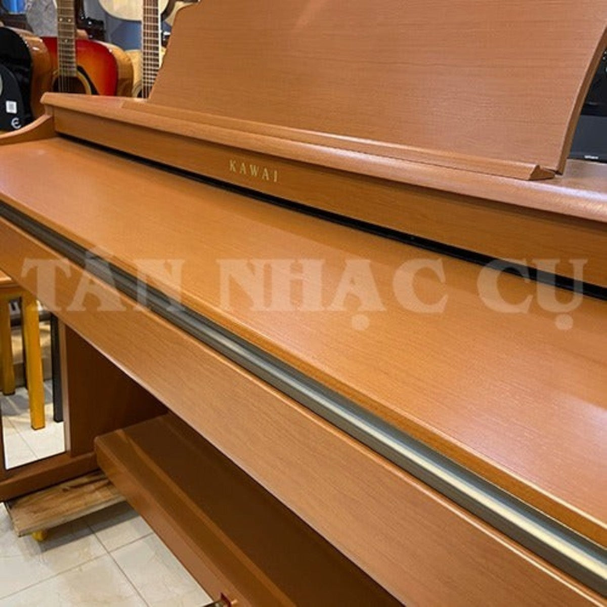 Đàn piano điện Kawai CN33 dáng tủ màu gỗ tự nhiên sang trọng tại TÂN NHẠC CỤ