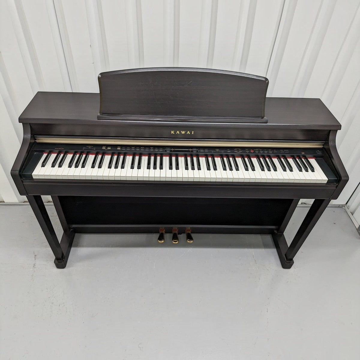 Đàn piano điện Kawai CN33 màu nâu gỗ sang trọng với thiết kế dáng tủ hiện đại tại TÂN NHẠC CỤ