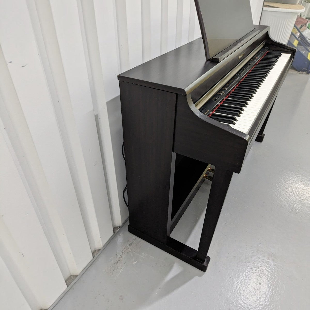 Đàn piano điện Kawai CN33 màu đen sang trọng với thiết kế dáng tủ hiện đại tại cửa hàng TÂN NHẠC CỤ