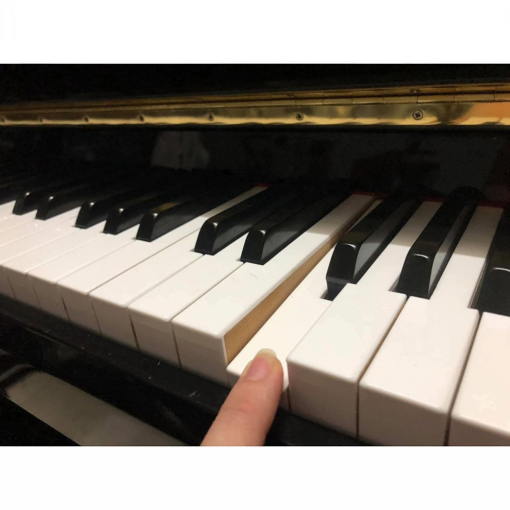 Bàn phím gỗ nặng của đàn piano điện giả cơ Kawai HE10 tại Tân Nhạc Cụ với chi tiết phím gỗ lộ rõ
