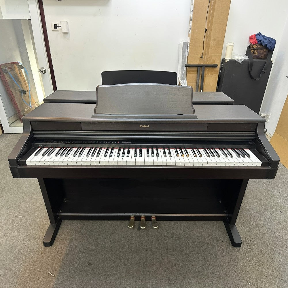 Đàn piano điện Kawai PW-820 cũ màu nâu đen với bàn phím gỗ tại Tân Nhạc Cụ