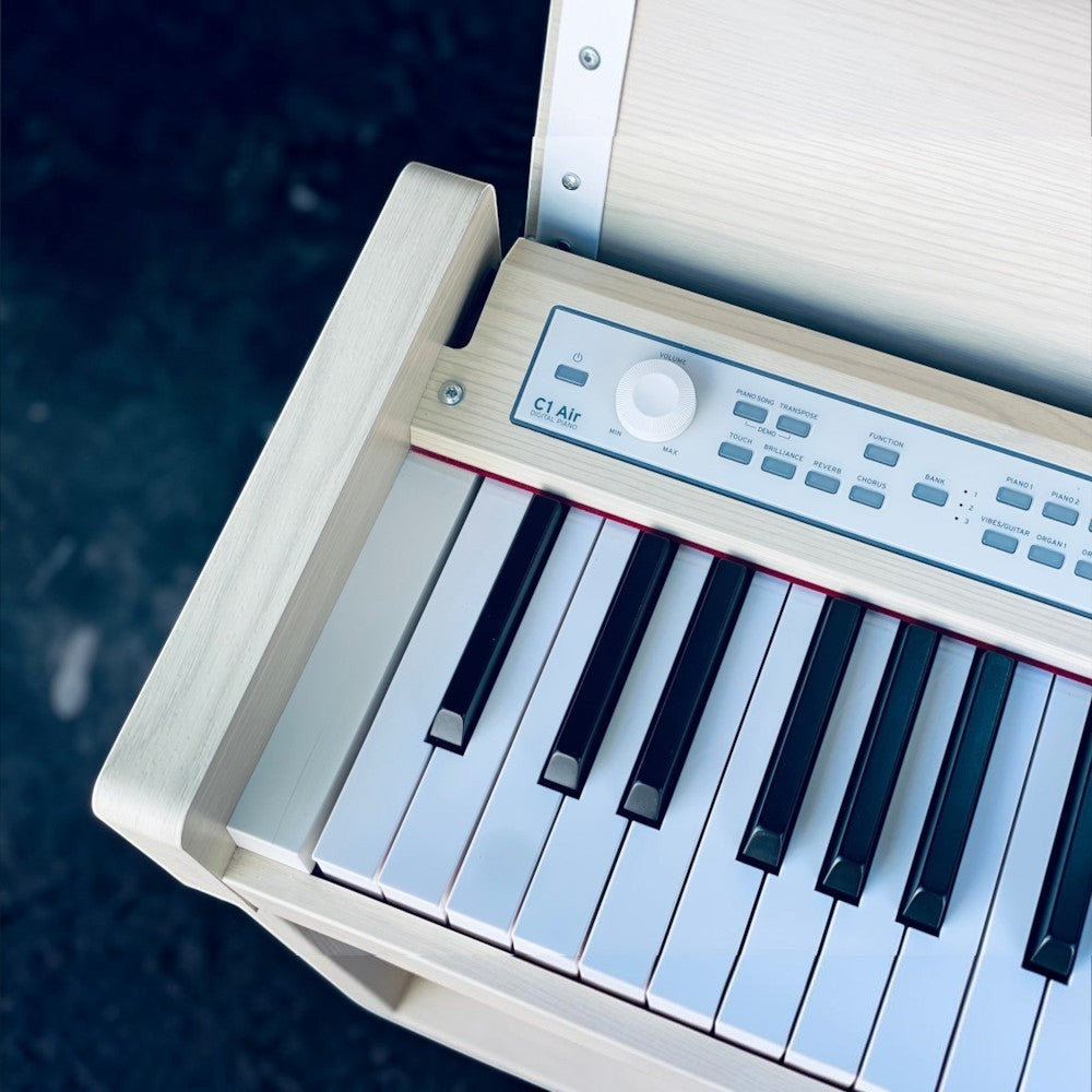 Đàn piano điện Korg C1 Air màu trắng vân gỗ với bàn phím RH3 cao cấp tại Tân Nhạc Cụ