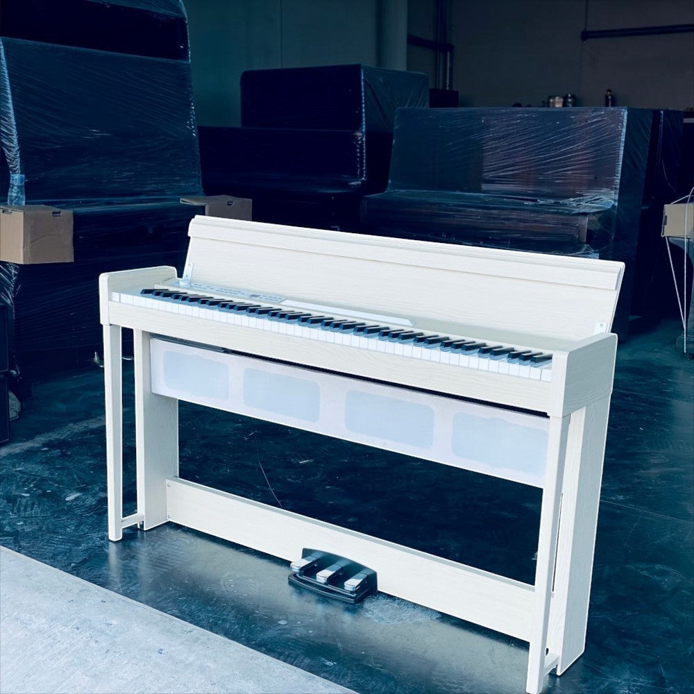 Đàn piano điện Korg C1 Air màu trắng tại Tân Nhạc Cụ, thiết kế dáng tủ thanh mảnh với 88 phím búa RH3 cao cấp.