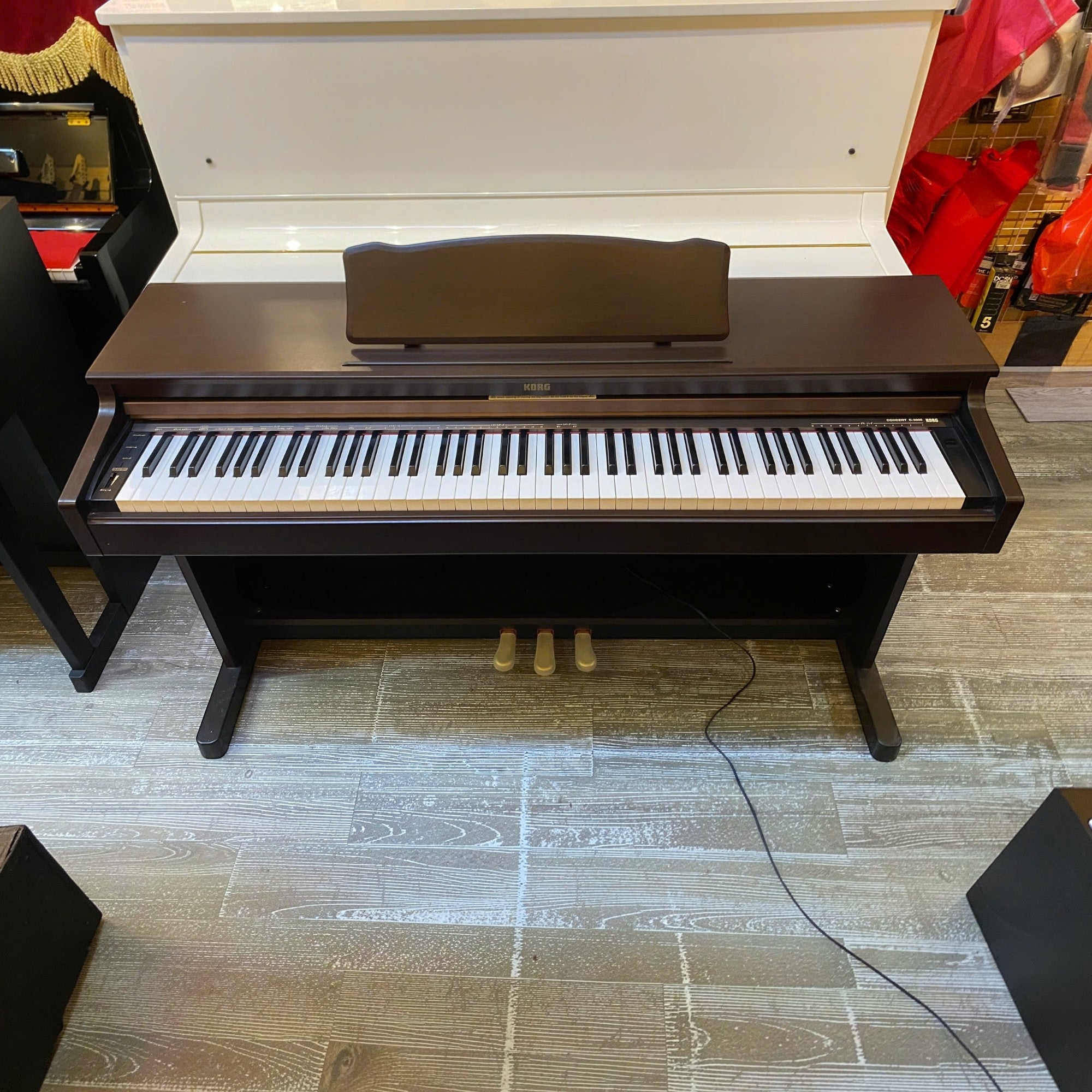 Đàn piano điện Korg C3000 màu nâu gỗ sang trọng với 88 phím nặng tại cửa hàng TÂN NHẠC CỤ