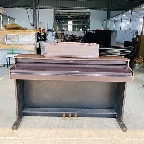Đàn piano điện Korg C4500 dáng console màu nâu gỗ tại Tân Nhạc Cụ với 88 phím búa và 3 pedal