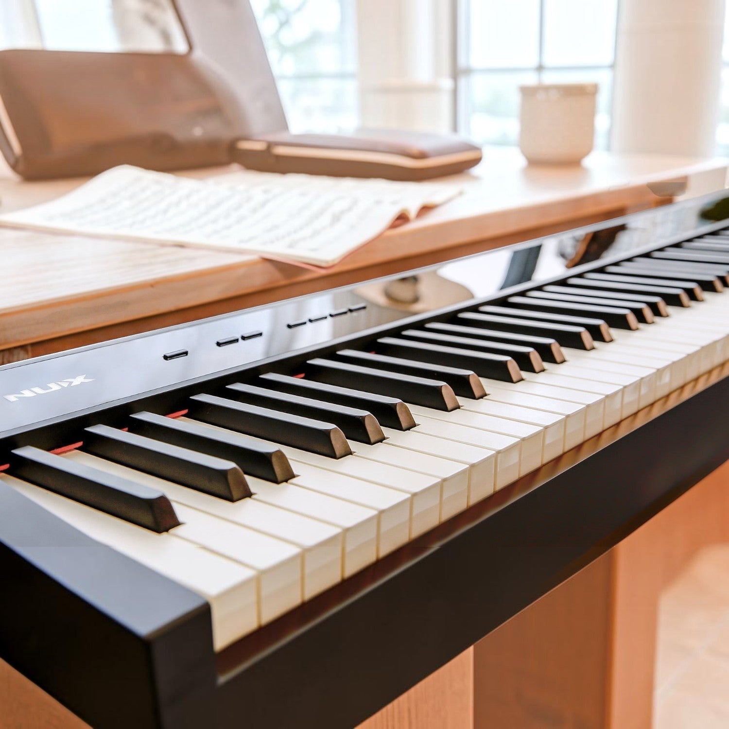 Đàn piano điện NUX NPK-10 màu đen tại Tân Nhạc Cụ với bàn phím 88 phím búa WKJ-03 và bề mặt phím giả ngà