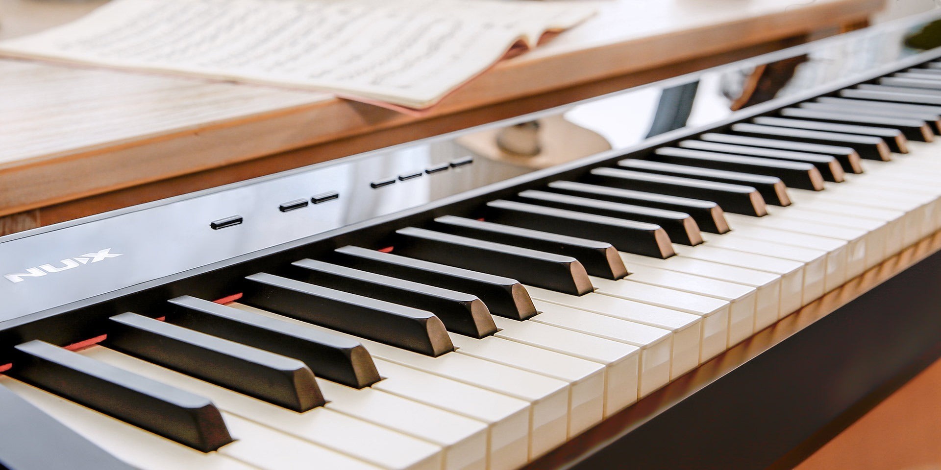 Đàn piano điện NUX NPK-10 màu đen tại Tân Nhạc Cụ với bàn phím 88 phím búa WKJ-03 và bề mặt phím giả ngà