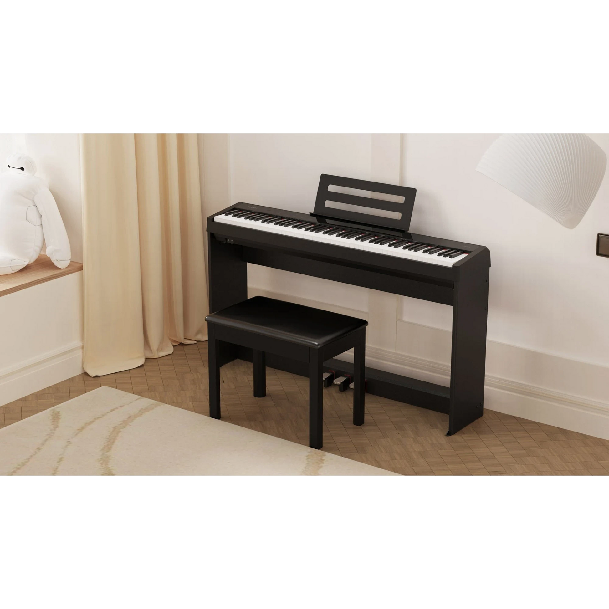 Đàn piano điện Nux NPK200 màu đen hiện đại với ghế ngồi trong không gian phòng khách sang trọng tại TÂN NHẠC CỤ