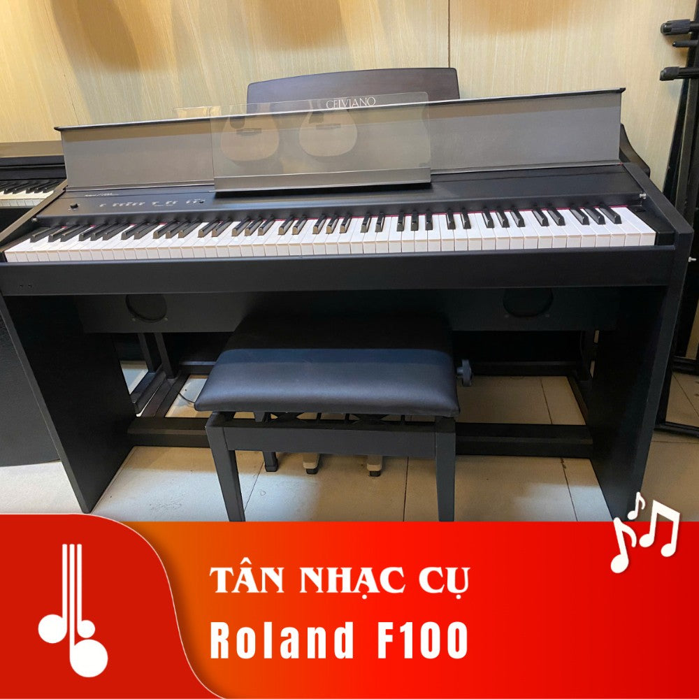 Đàn piano điện Roland F100 màu đen tại TÂN NHẠC CỤ, thiết kế dáng tủ gọn gàng với bàn phím búa 88 phím.