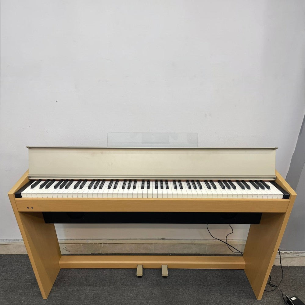 Đàn piano điện Roland F100 dáng tủ gọn màu gỗ thích với bàn phím búa 88 phím tại TÂN NHẠC CỤ