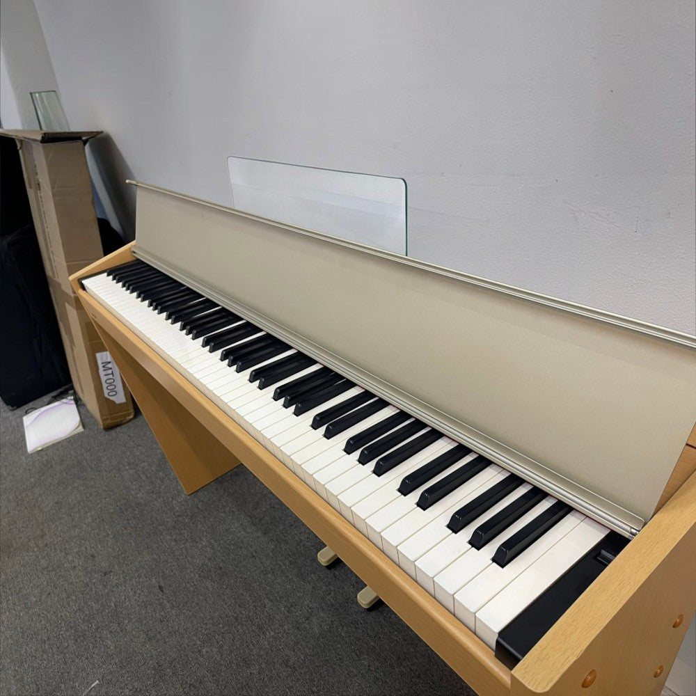 Đàn piano điện Roland F100 dáng tủ gọn màu gỗ thích tại TÂN NHẠC CỤ, bàn phím búa 88 phím cho người mới tập
